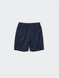 Dark blue shorts with an elastic waistband, laid flat on a white background.